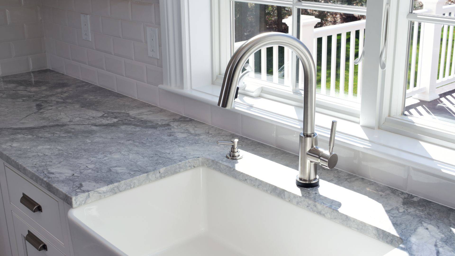Image of a new faucet and sink to represent Elkhorn Heating & Air's kitchen plumbing services