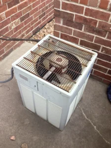Littleton AC repair technician diagnosing a Goodman system that was not producing cold air.