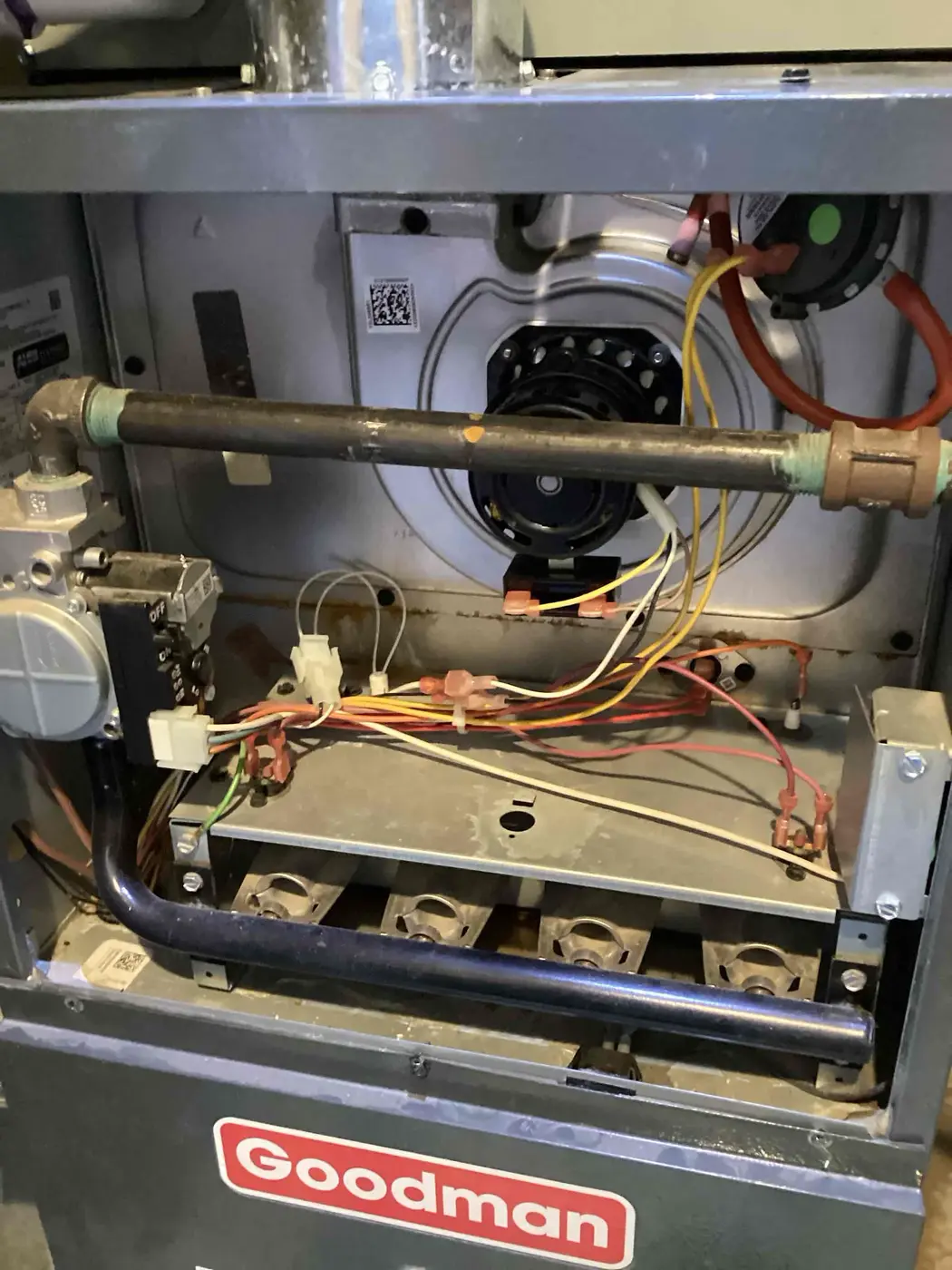 Open Goodman furnace cabinet inspected during a Denver condensate overflow service.